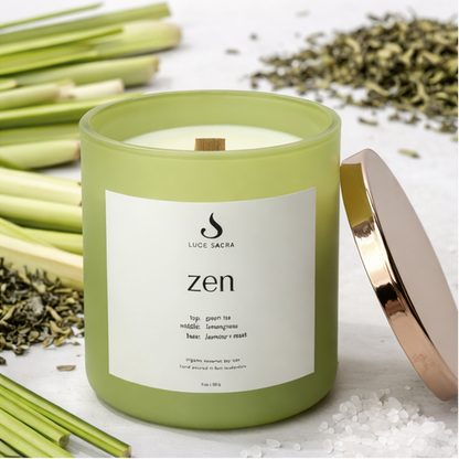Green 'zen' candle with decorative elements on a white background
